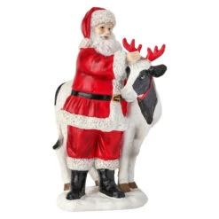 Resin Santa With Cow Figurine