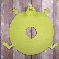 Department 56 Snowpinion - Grinch Stuffed Tree Skirt -Christmas Loft Shop 396058 2 Photoroom 33669.1745340351