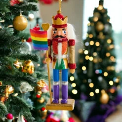 Kurt Adler 6" Gay Pride Nutcracker Ornament 12 Kurt Adler 6" Gay Pride Nutcracker Ornament -Christmas Loft Shop Gay Pride Nutcracker style rainbow again tree Photoroom 84087.1715200887
