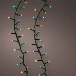 Lumineo 1000 LED Multi-Colored Compact Lights Green Wire -Christmas Loft Shop Lights on darker background 72786.1701909336